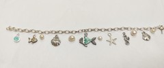 Seascape and woodland charm bracelets