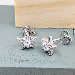 Pave set cubic zirconia star earrings