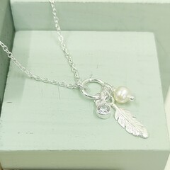 Feather pearl and cubic zirconia 3 charm necklace