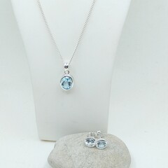 Sky blue topaz round bezel studs