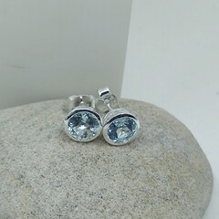 Sky blue topaz round bezel studs