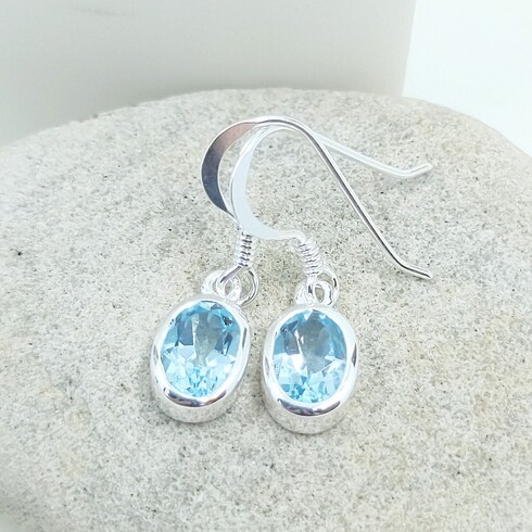 Small oval bezel sky blue topaz drop earrings