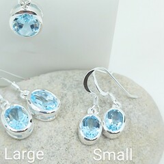 Small oval bezel sky blue topaz drop earrings